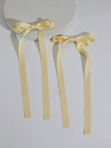 Elegantne pastelne ukosnice sa satenskim mašnama