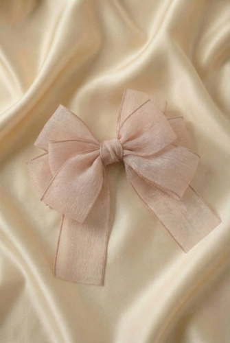 Elegantna ukosnica za djevojčice – ružičasta mašna za posebne prigode